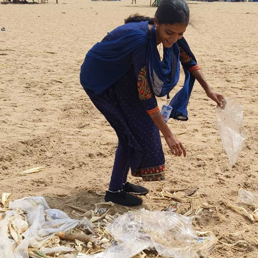 Active community members clean up beach - Timeless Foundation