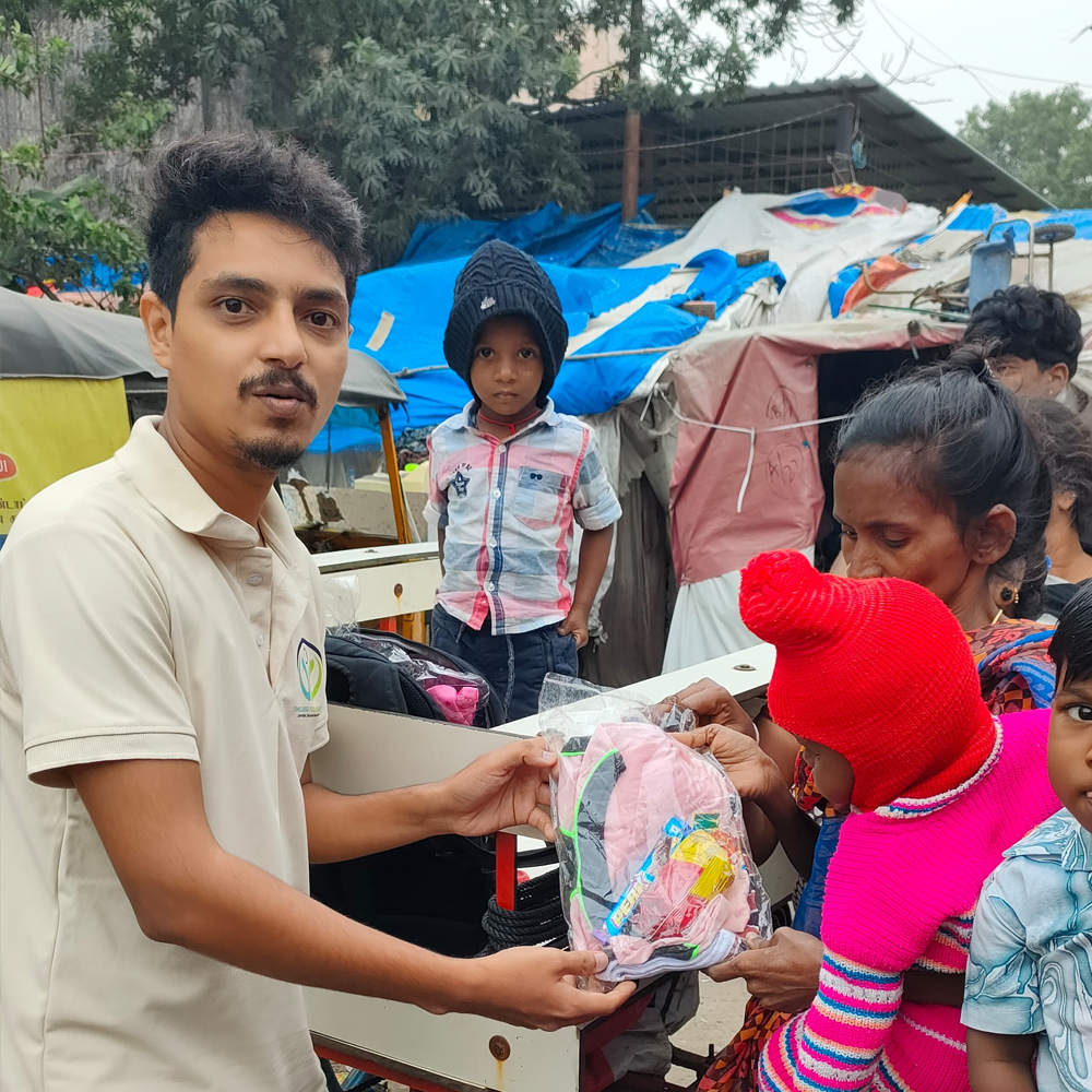 Cloths and snacks distribution event - Timeless Foundation