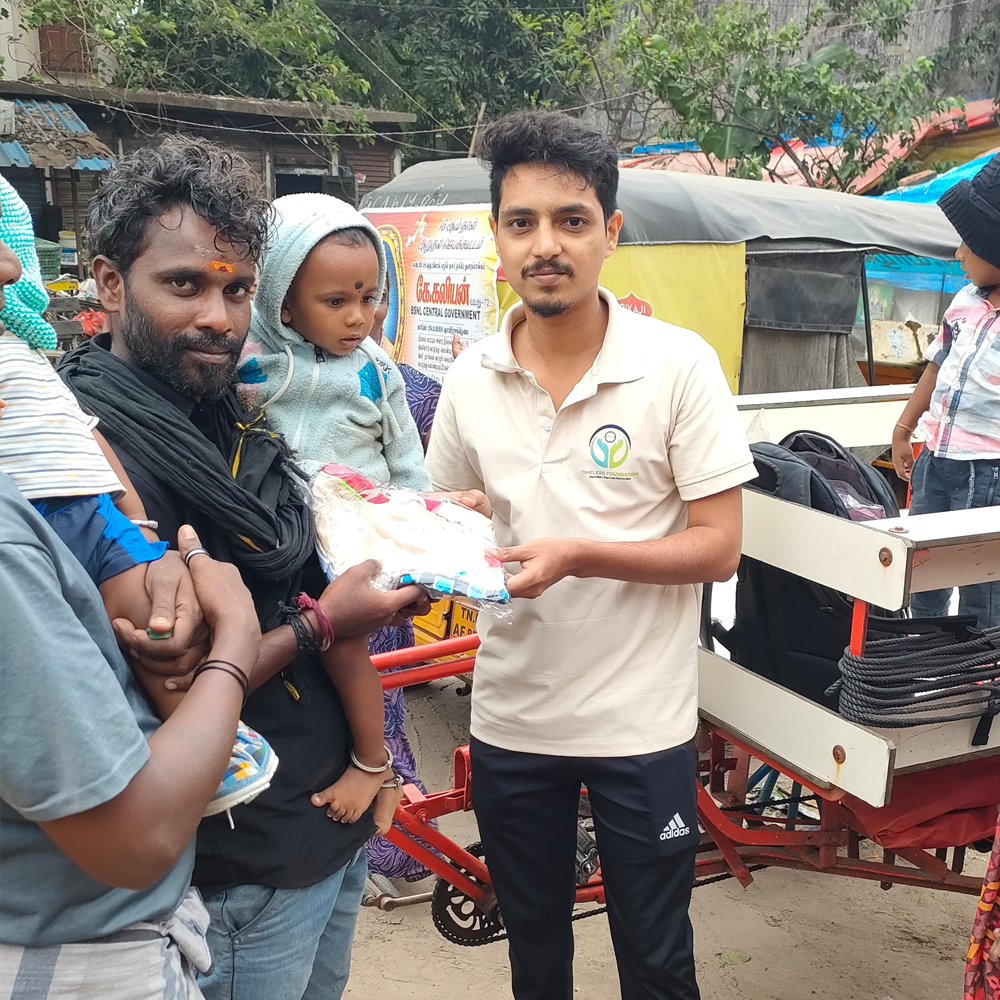Cloths and snacks distribution event - Timeless Foundation