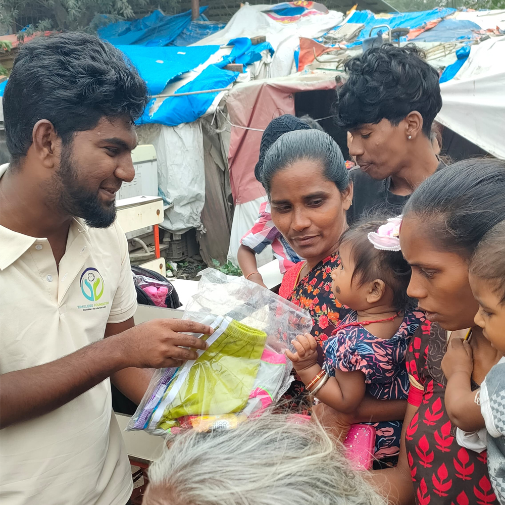 Cloths and snacks distribution event - Timeless Foundation